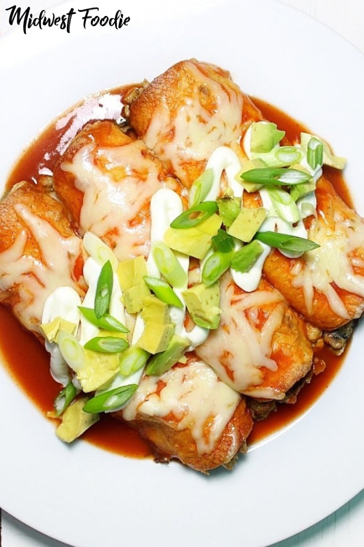 The Easiest Vegetarian Enchiladas -- These veggie enchiladas are loaded with protein, fiber and fresh flavors! Your family won't even miss the meat, I promise. They are SUPER easy to prepare and the leftovers taste even better the next day! #midwestfoodie #mealprep #healthy #family #dinner #quick #simple #easy #Mexican