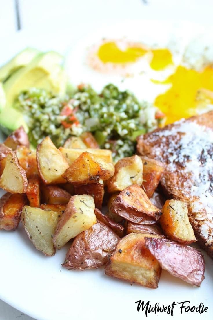 The Best Roasted Breakfast Potatoes | Midwest Foodie | These crispy, oven roasted breakfast potatoes are the perfect accompaniment to any delicious breakfast, brunch over even dinner spread! #midwestfoodie #brunch #breakfast #friends #family #dinner #easy #simple #recipe