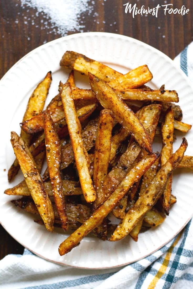 The Best Ever Crispy Baked Fries | Midwest Foodie | The most perfect baked fries ever! No fryer necessary, yet they're still perfectly crisp on the outside and tender on the inside. #midwestfoodie #healthy #potatoes