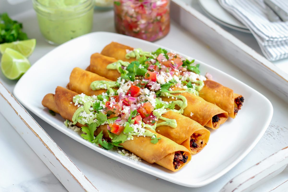 Ground Beef Flautas with Cilantro Avocado Sauce | Midwest Foodie