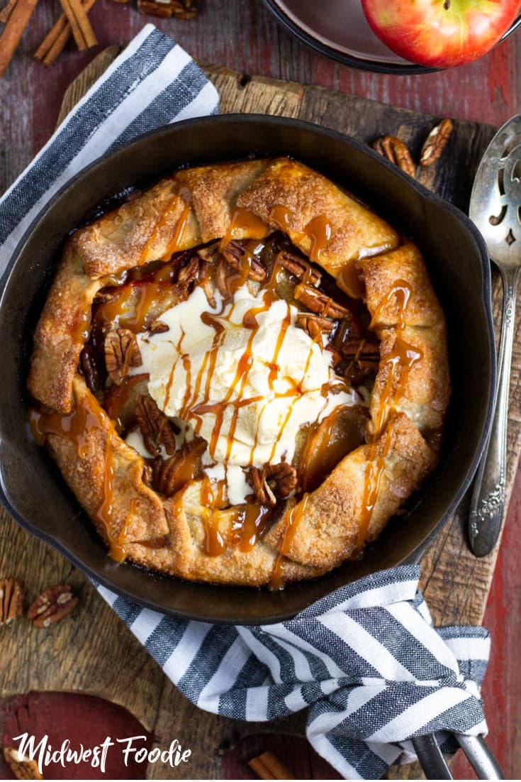 The Easiest Apple Galette Ever -- This apple galette is seasonal, simple and scrumptious! Store bought crust makes this dessert quick, easy and accessible for even the most novice of home cooks. #midwestfoodie #simple #easy #dessert #recipe #family #weeknight #dinner #icecream