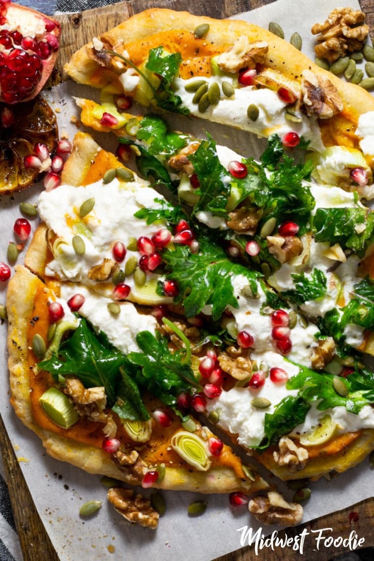 Fall Harvest Vegetarian Pizza with Roasted Squash Cream Sauce | Midwest Foodie | This fall harvest vegetarian pizza combines my favorite no knead pizza dough with roasted squash cream sauce and sliced leeks, topped with creamy burrata and fresh arugula tossed in a grilled lemon vinaigrette. #midwestfoodie #family #dinner #weeknight #meal #simple #healthy #easy #recipe