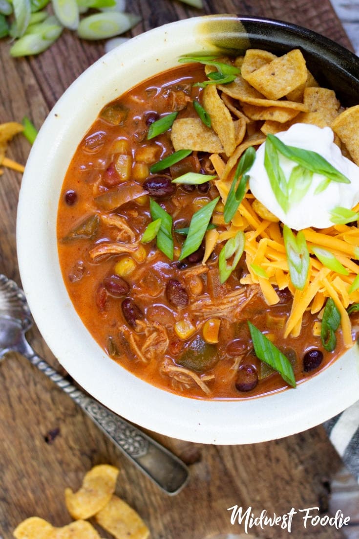 Chipotle Chicken Enchilada Southwest Chili | Midwest Foodie | This is one of my family's favorites. We make it often and it never lasts long because it's so darn good! As with most crock pot recipes, the prep time is really very minimal and the slow cooker does all the work.