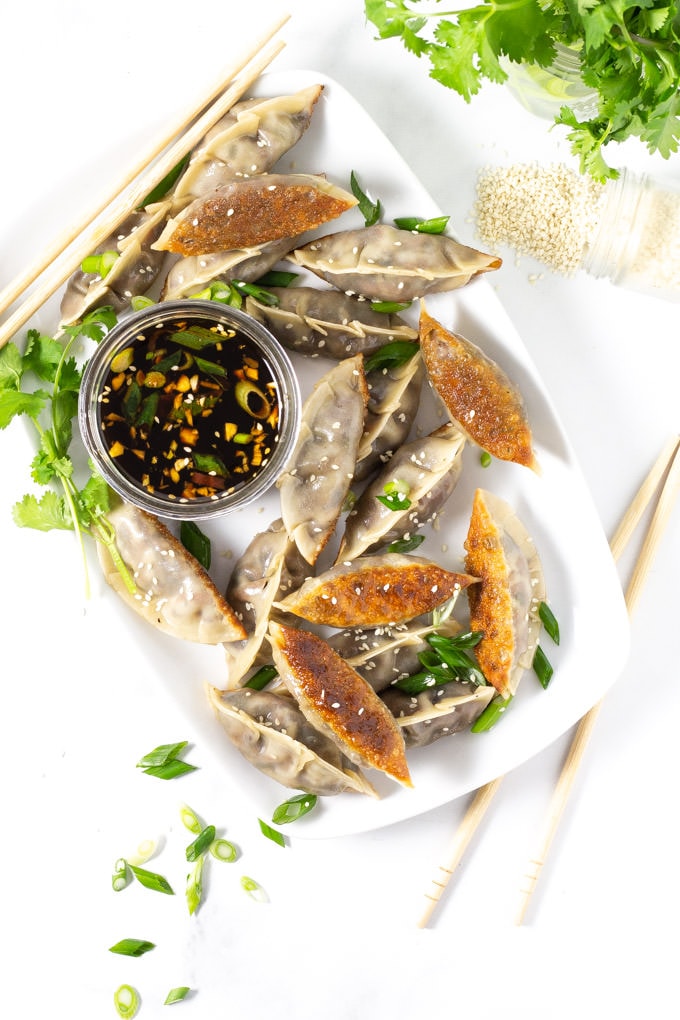 Overhead shot of vegan dumplings on a serving platter