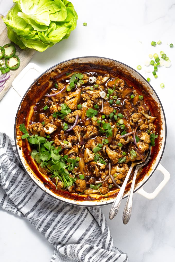 Overhead shot of a pan filled with Korean Cauliflower garnished with fresh cilantro