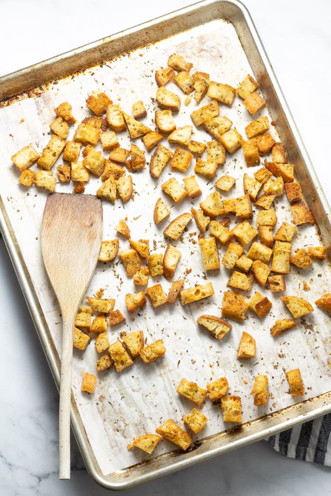Overhead shot of a pan filled with homemade fresh baked croutons