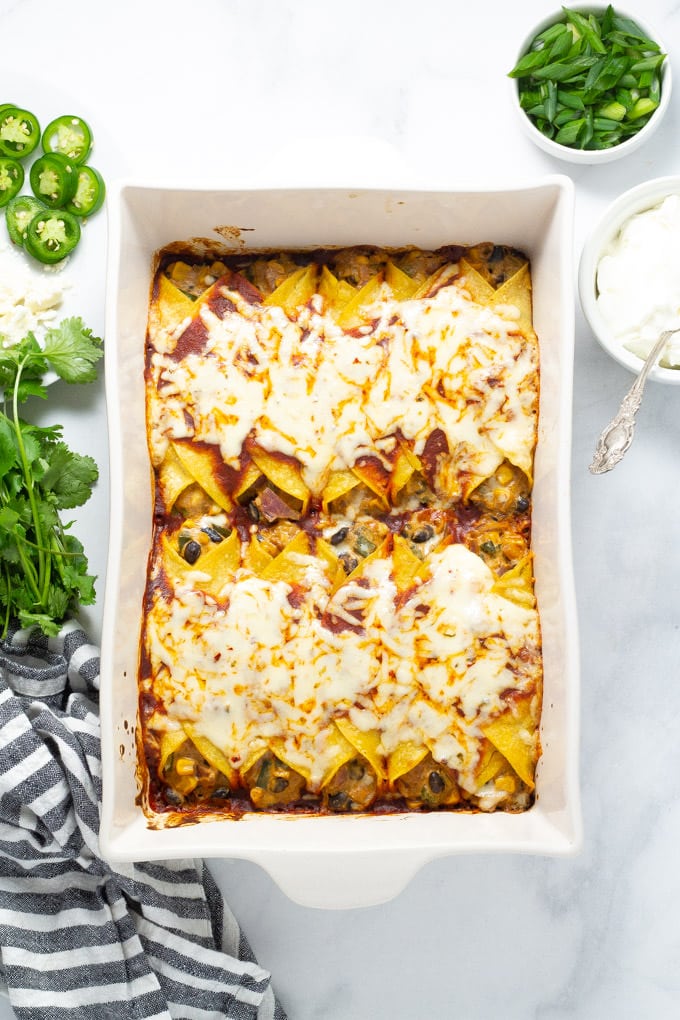 Overhead shot of a pan of veggie enchiladas fresh from the oven