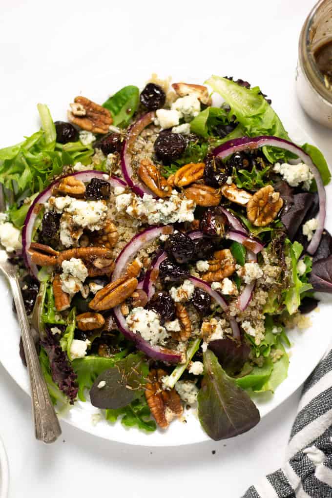 Close up shot of a dried cherry salad with Gorgonzola cheese and red onions
