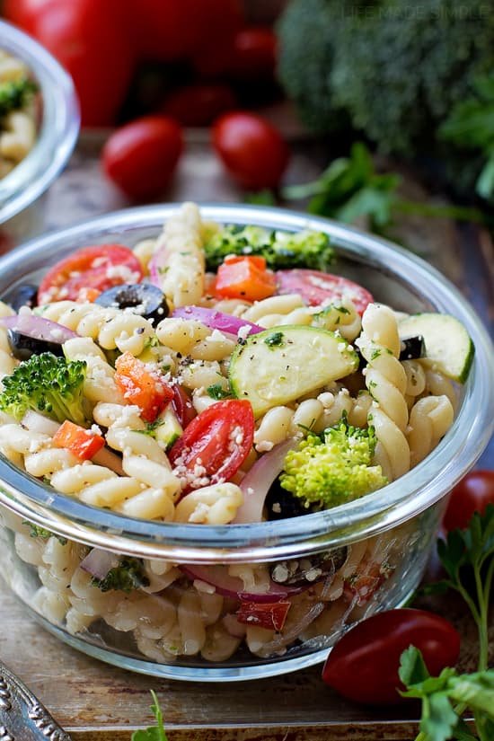 Close up shot of a pasta salad loaded with fresh veggies