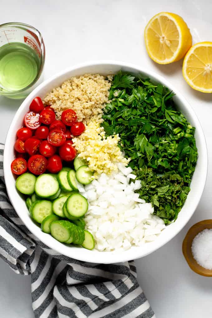 Overhead shot of a bowl filled with the ingredients to make tabbouleh