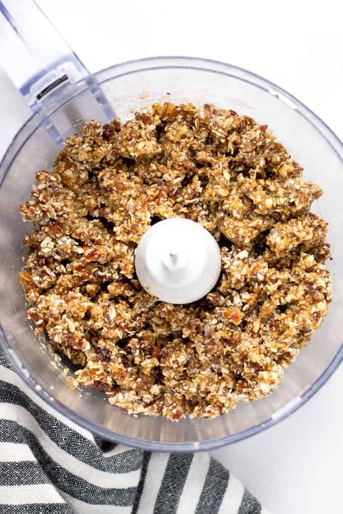 Close up shot of a food processor filled with fresh homemade rawnola