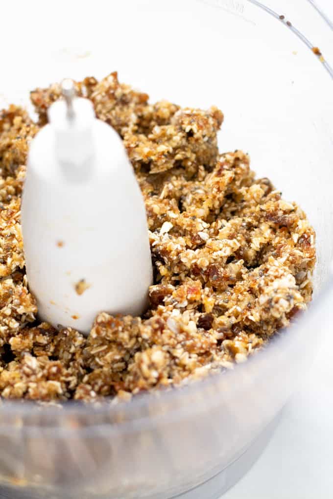 Close up shot of a food processor filled with fresh homemade rawnola