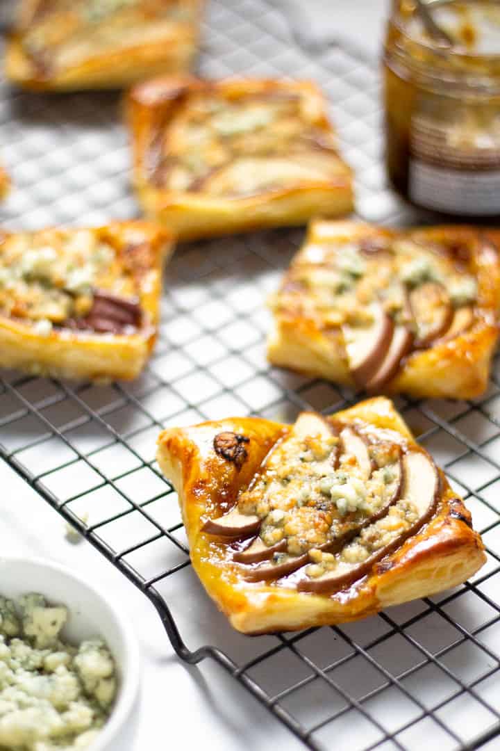 Close up shot of pear tarts on a cooling rack 