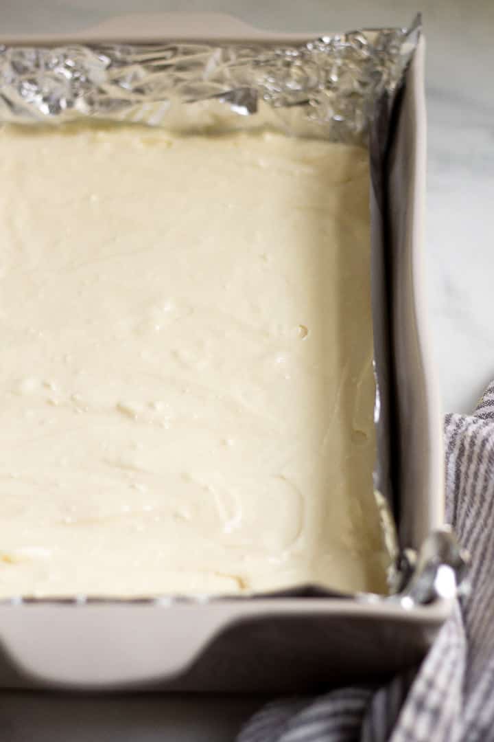 Close up shot of turtle cheesecake bars before being baked