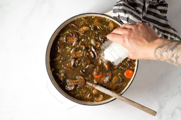 Large dutch oven filled with wild rice soup