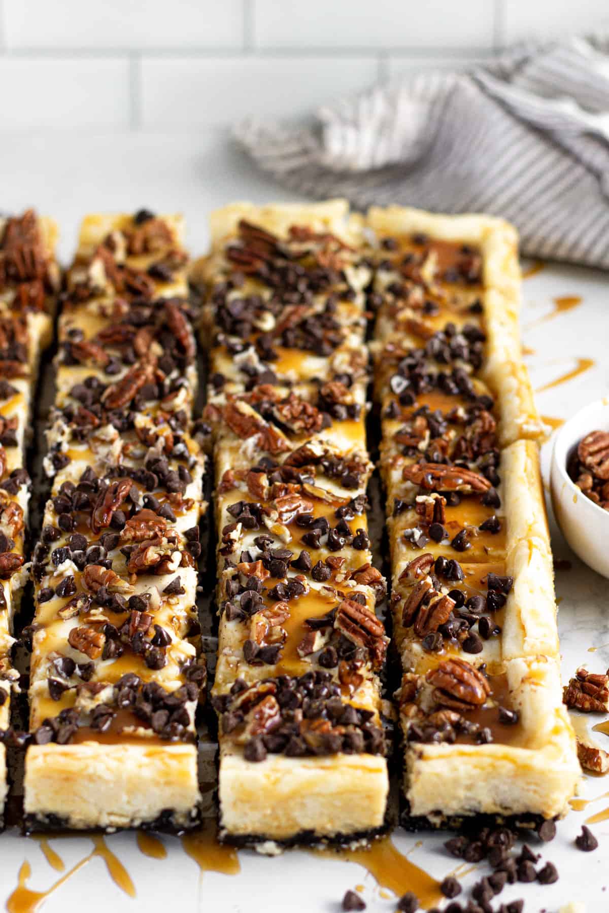 The Best Turtle Cheesecake Bars - Midwest Foodie