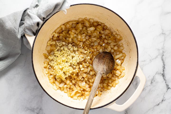 Large pot with sauteed onion and garlic