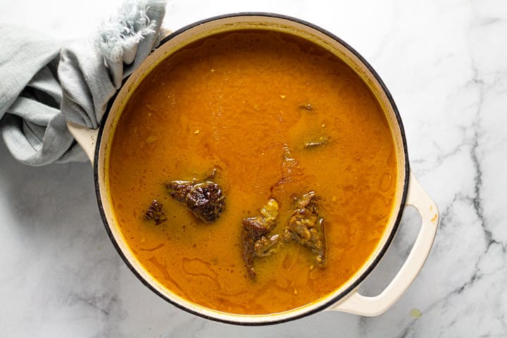 Large pot filled with curried beef