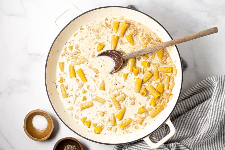 Large white pot with one pot rigatoni pasta