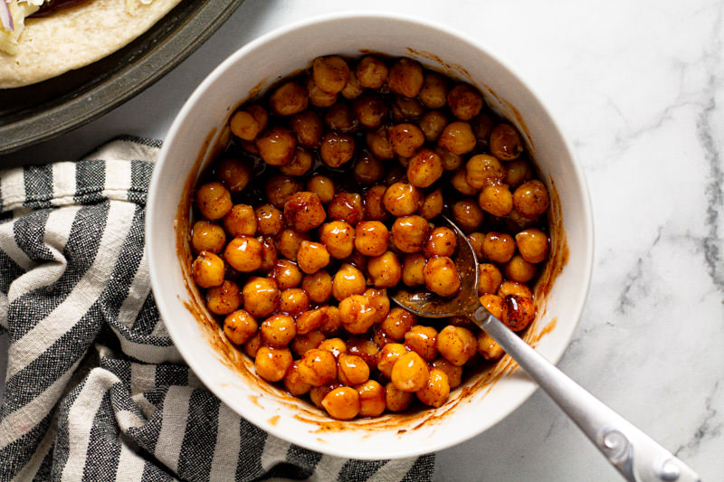 White bowl with barbecue chickpeas in it 