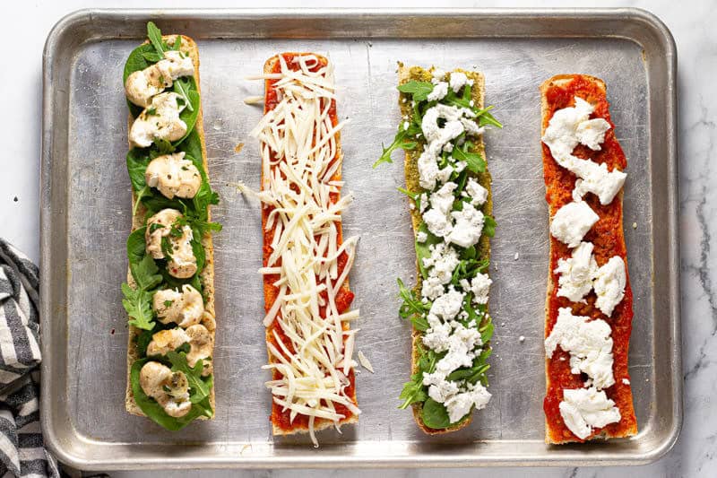 French bread pizza topped with sauce and cheese