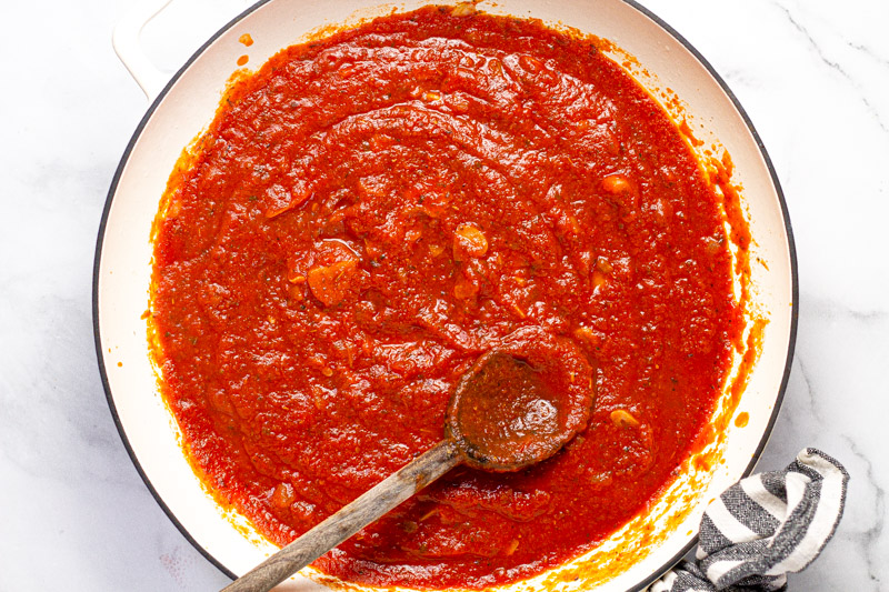 Large white pan with spaghetti sauce 