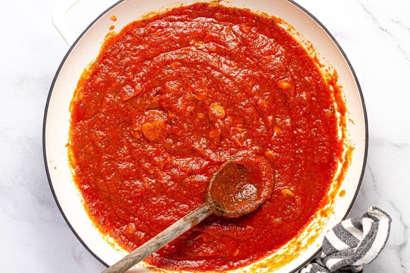 Large white pan with spaghetti sauce 