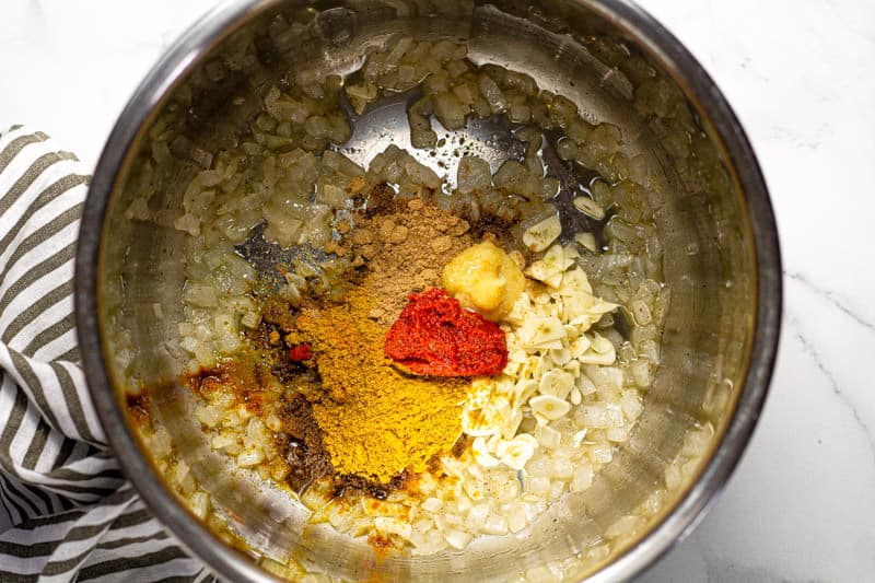 Instant pot insert with sauteed onions and spices in it
