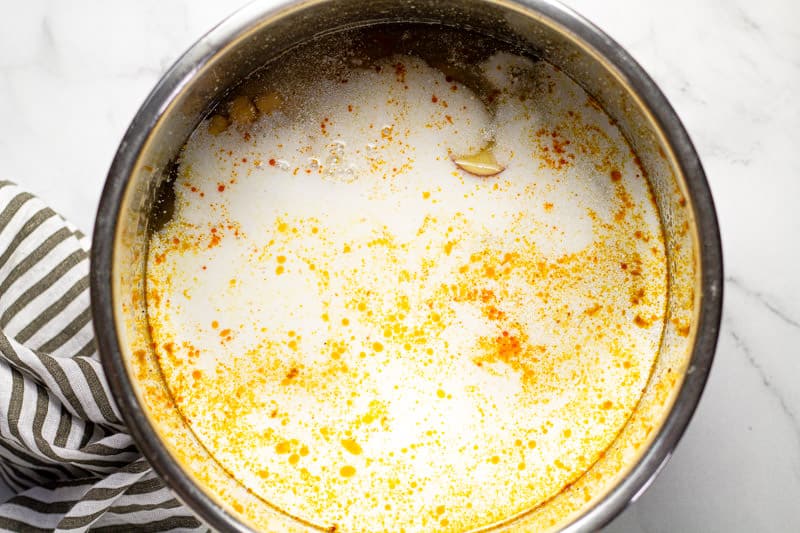 Instant pot insert with ingredients to make vegan chickpea curry