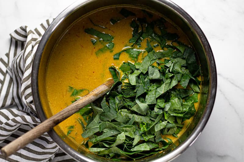 Fresh chopped spinach in a vegan instant pot curry
