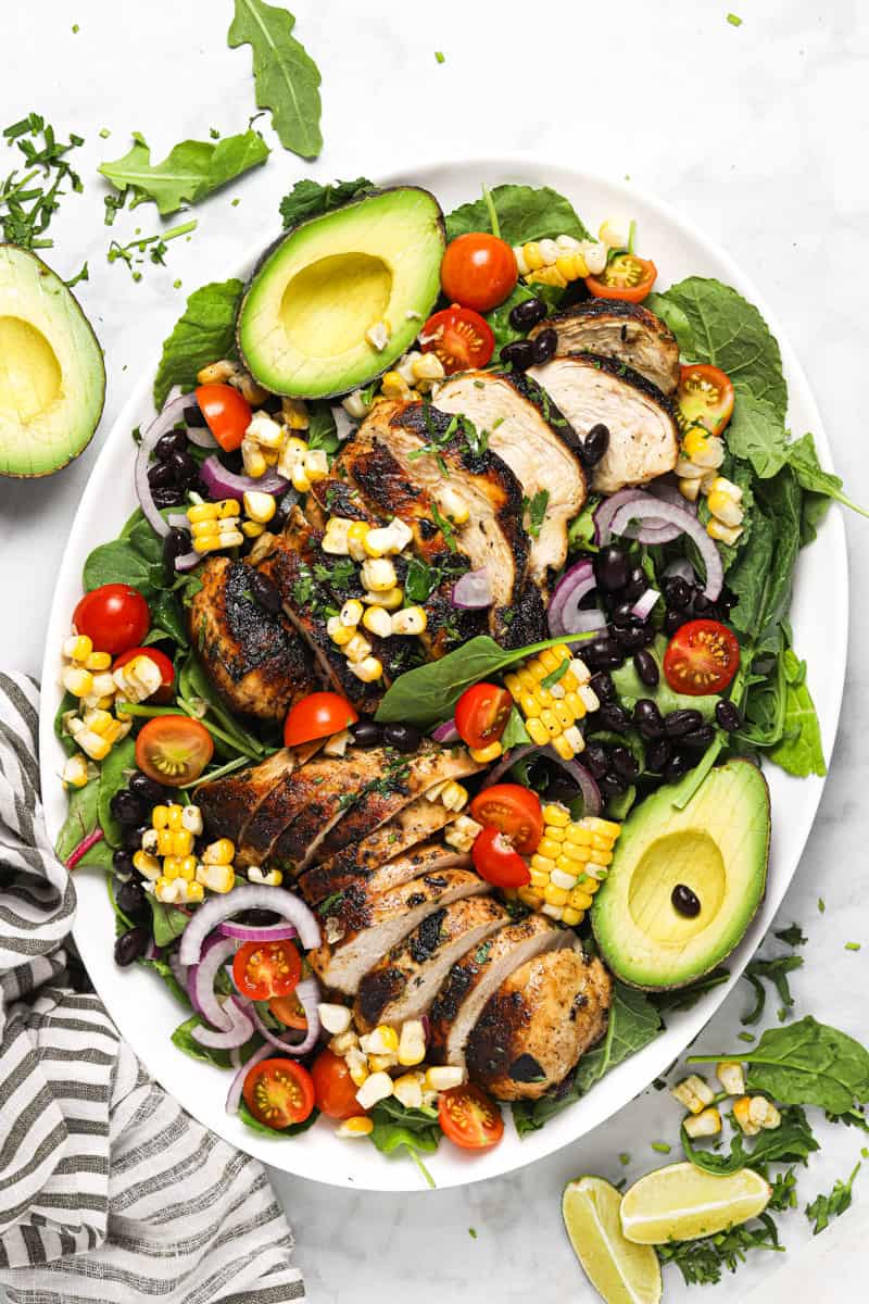 Large white platter with ingredients for making the easy Southwest salad recipe