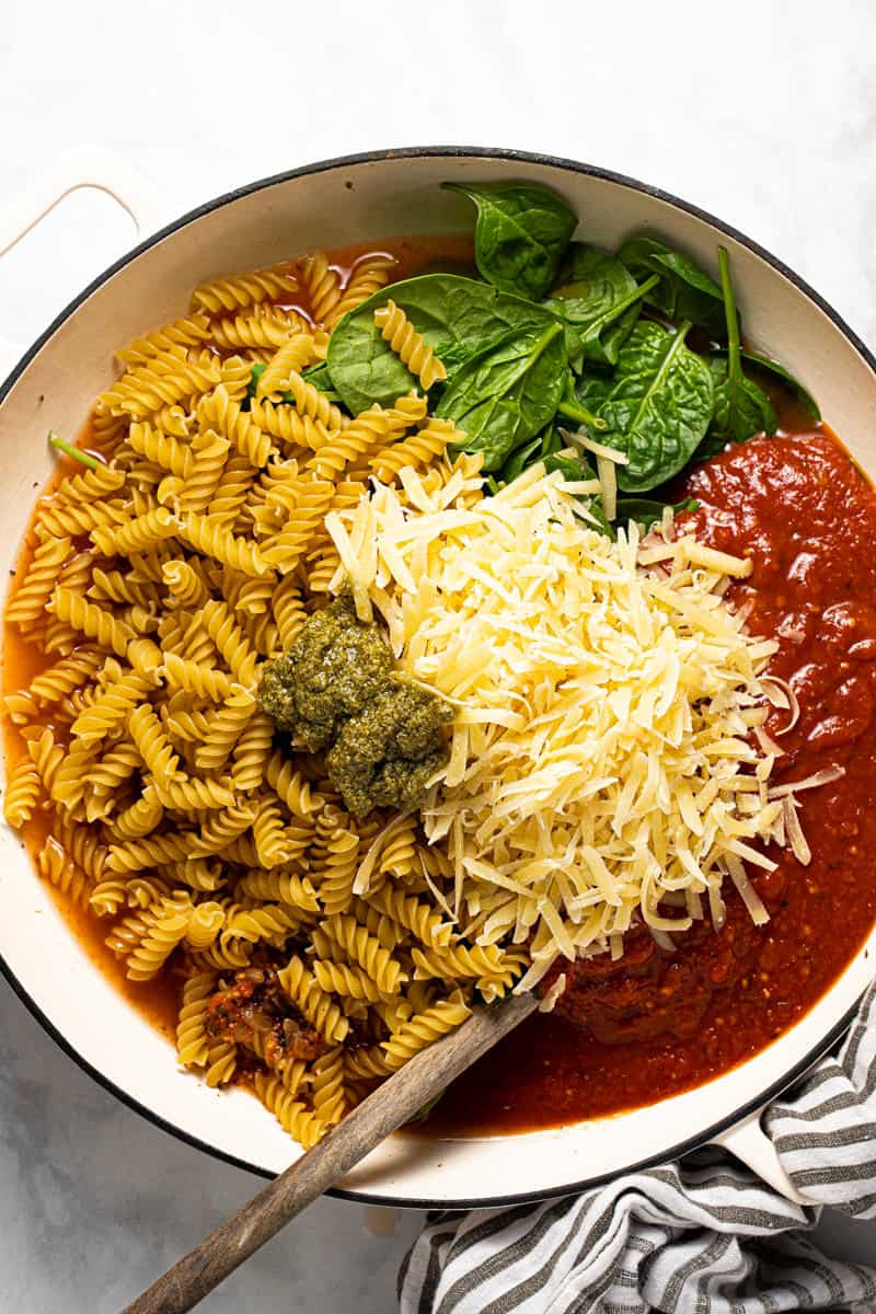 Large pan filled with ingredients to make no boil pasta bake