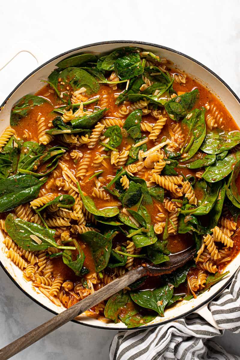 Large pan filled with ingredients to make no boil pasta bake