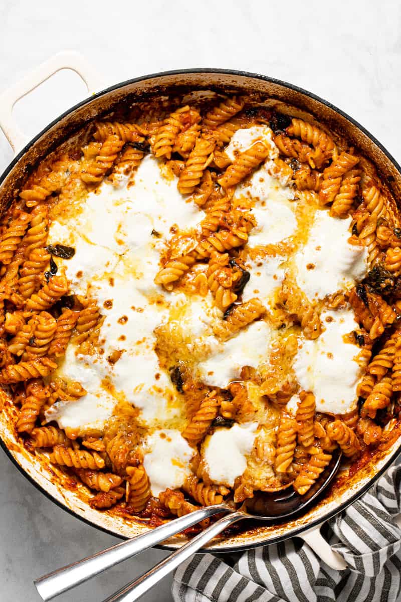 Large pan filled with ingredients to make no boil pasta bake