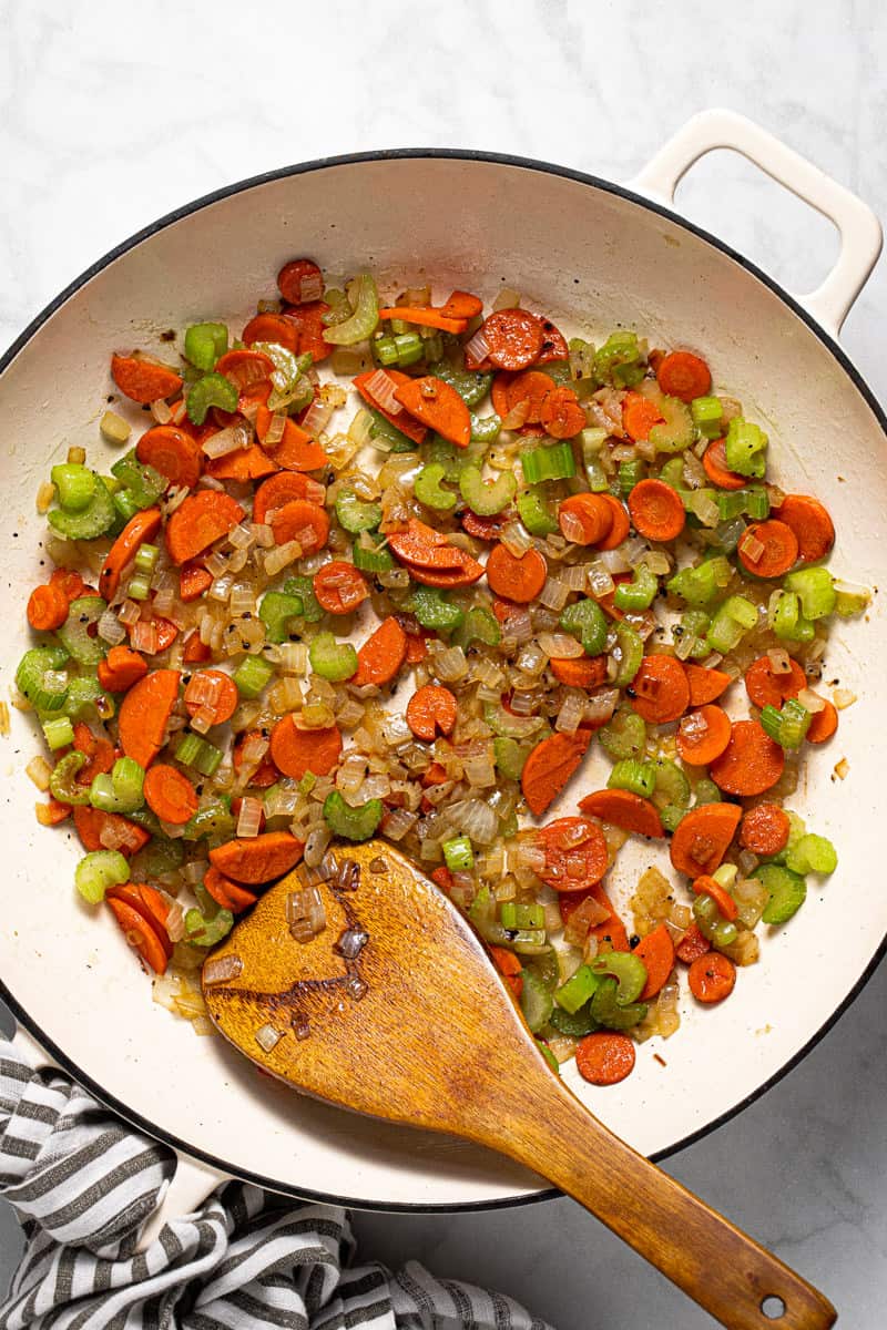 Photos showing step by step how to make one pan chickpeas and rice with broccoli
