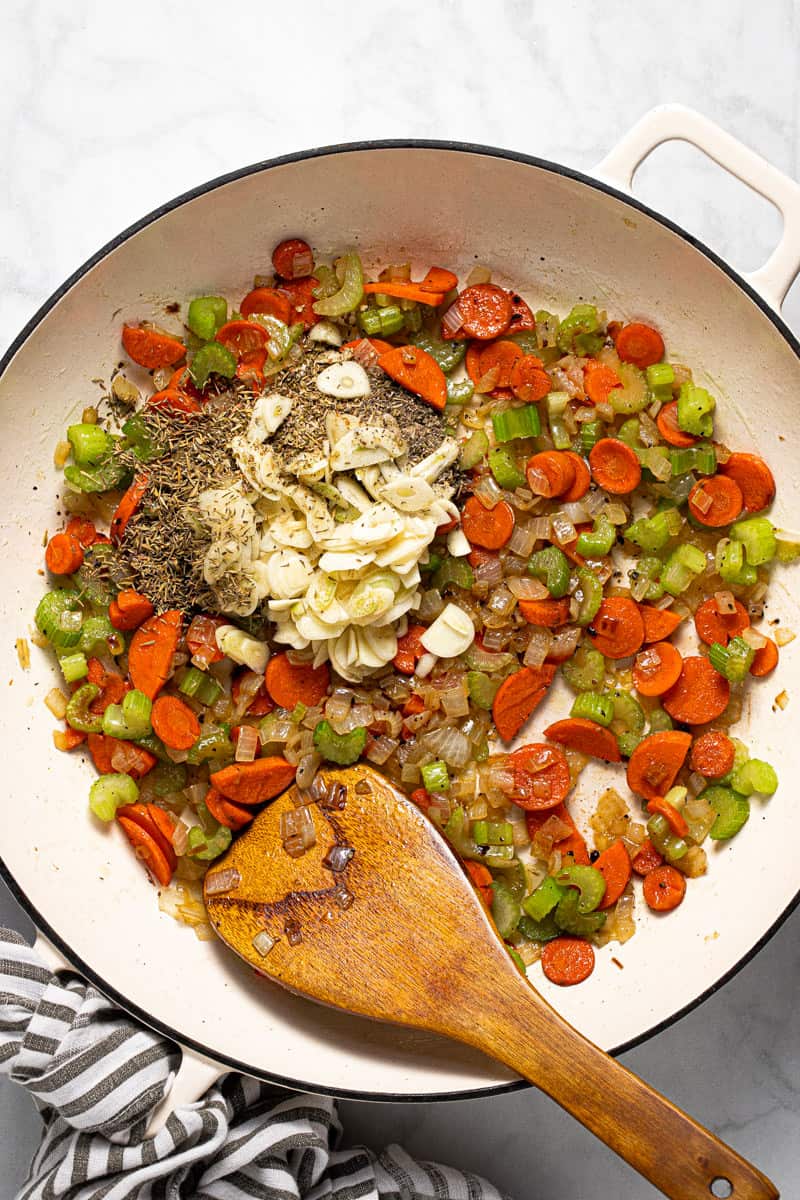 Photos showing step by step how to make one pan chickpeas and rice with broccoli