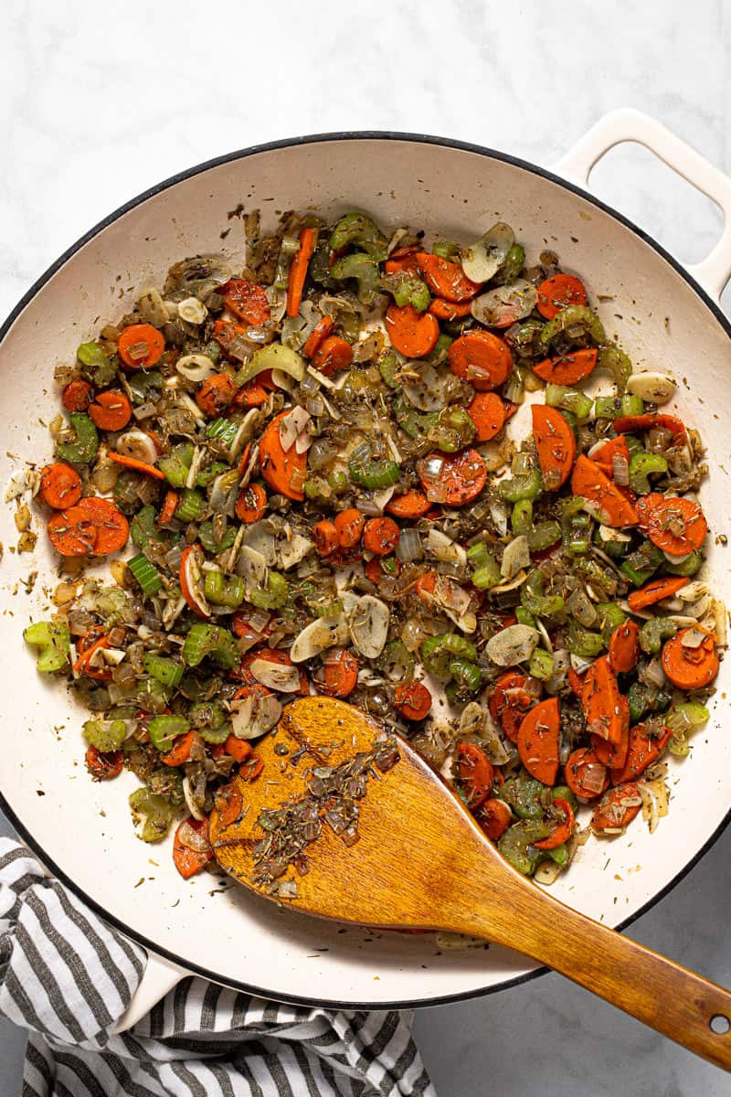 Photos showing step by step how to make one pan chickpeas and rice with broccoli