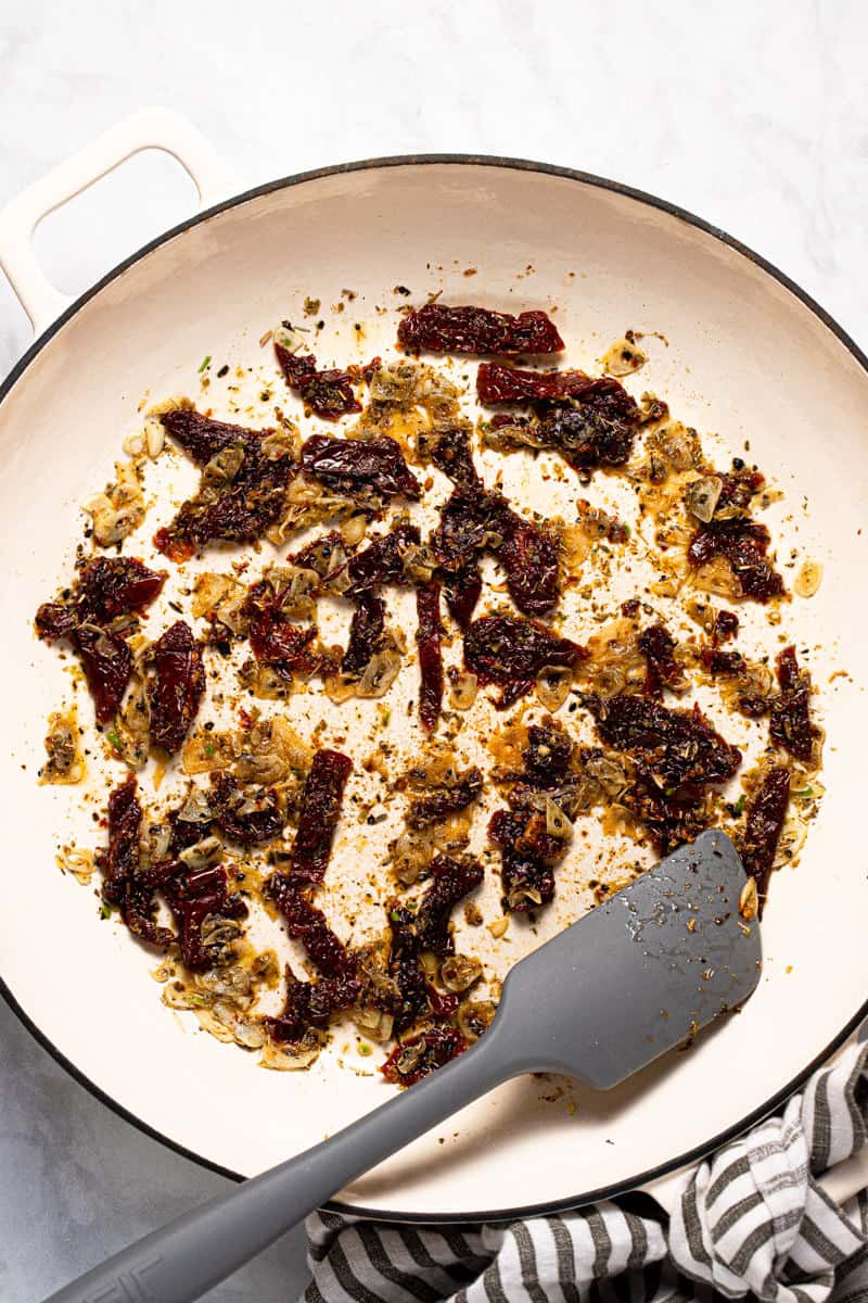 Photos showing step by step how to make creamy vegan Tuscan pasta