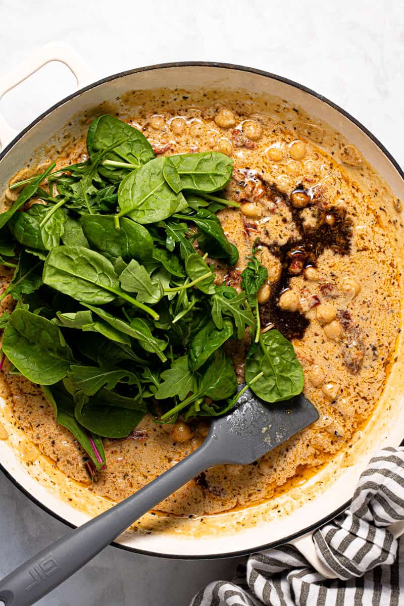 Photos showing step by step how to make creamy vegan Tuscan pasta