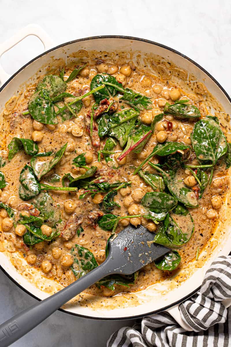 Photos showing step by step how to make creamy vegan Tuscan pasta