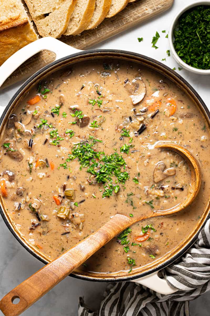 Large pot filled with homemade vegan mushroom wild rice soup