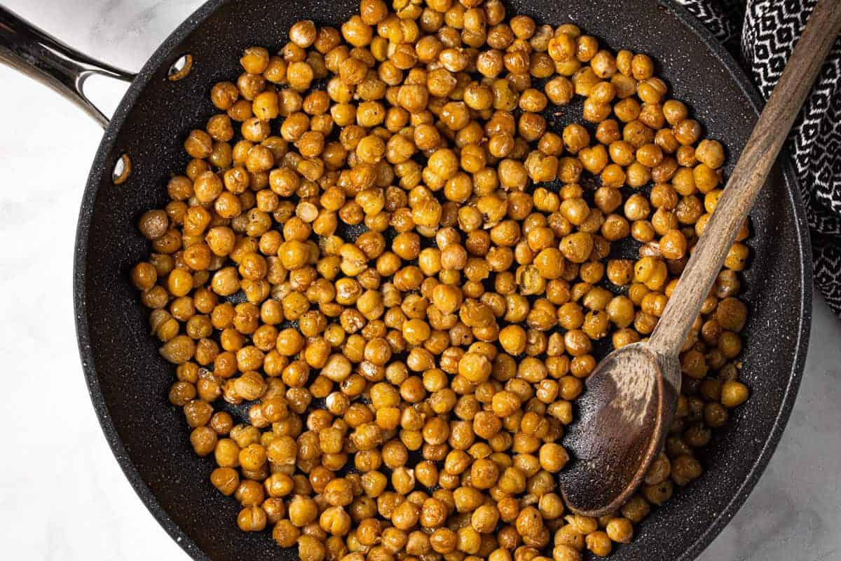 Skillet filled with roasted chickpeas