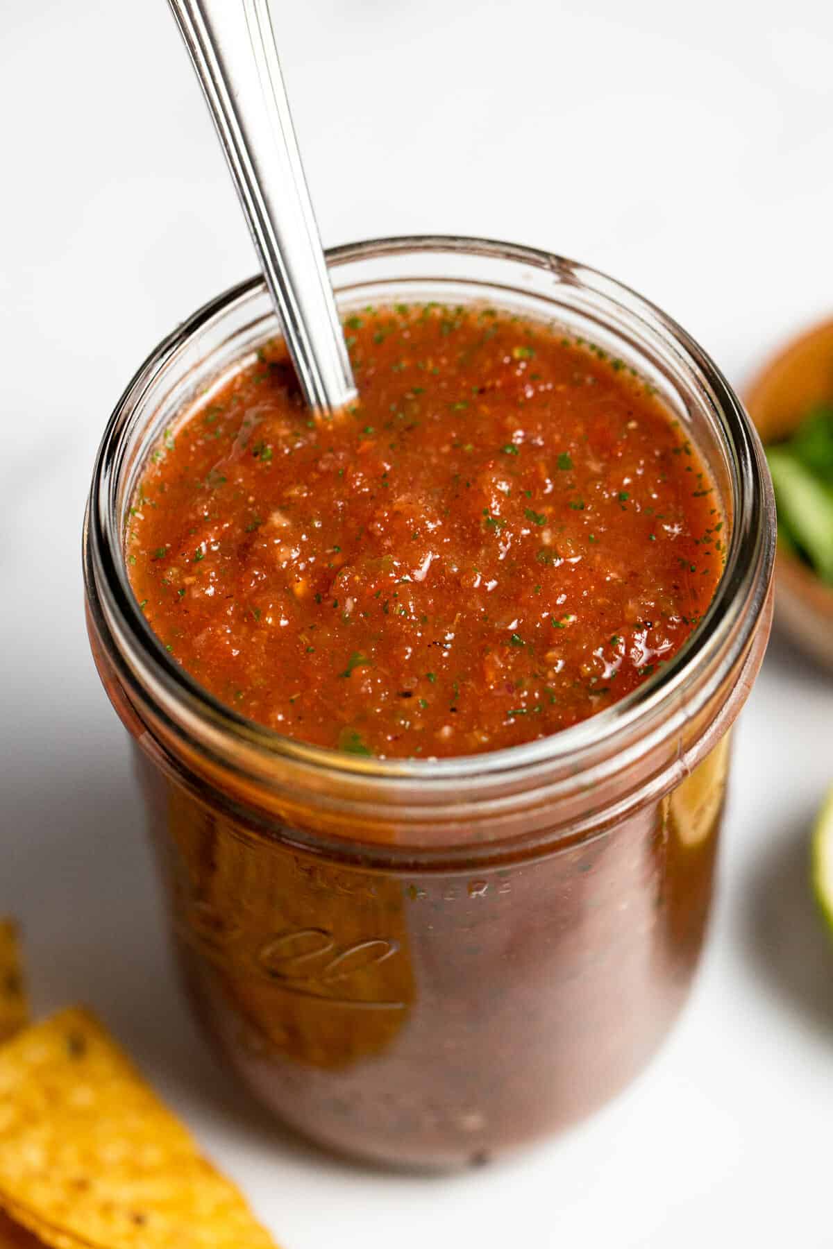Large mason jar filled with homemade blender salsa