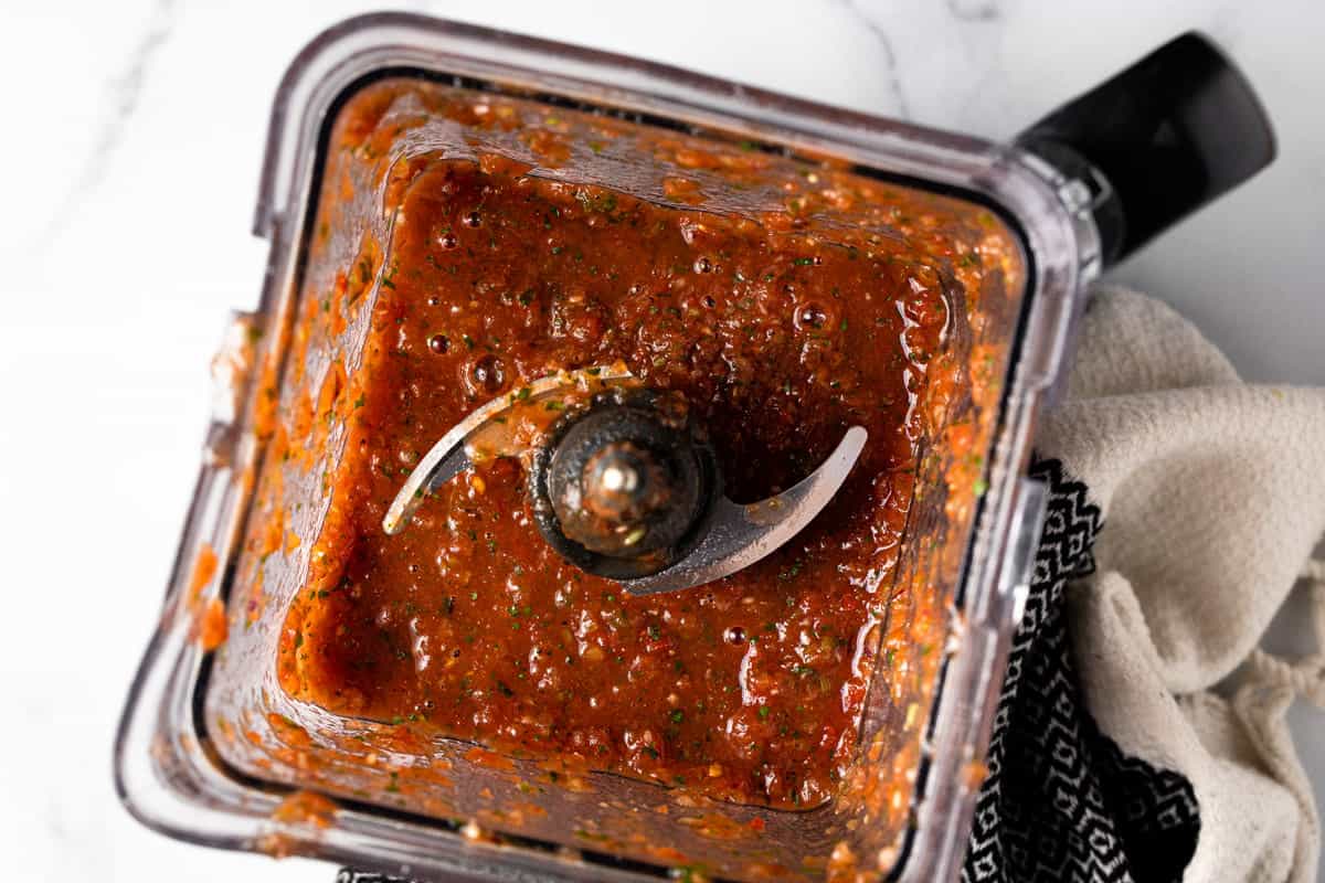 Blender filled with freshly made salsa