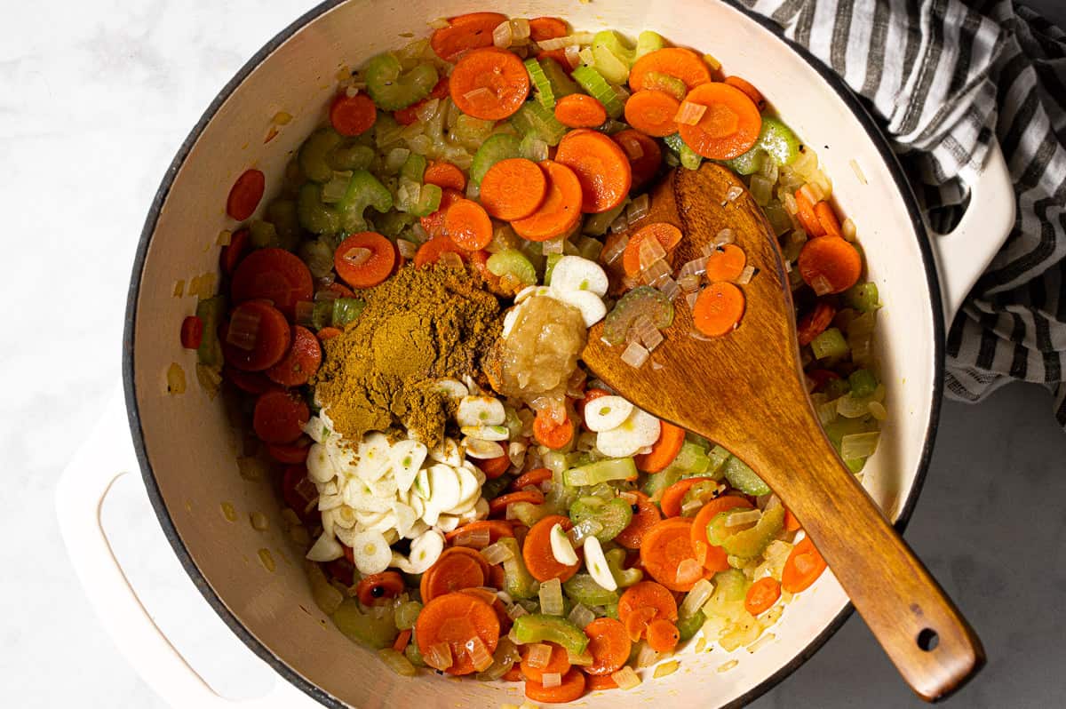 Large pot filled with sautéed veggies and spices