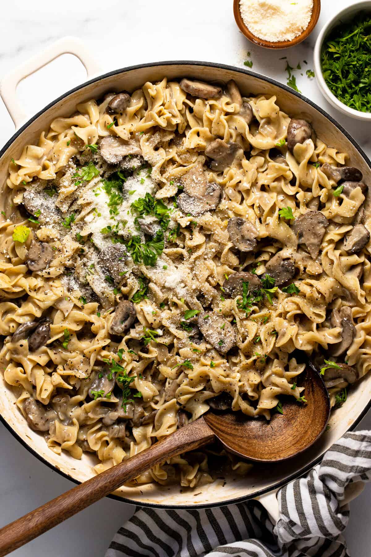 Large sauté pan filled with one pot mushroom stroganoff garnished with parsley