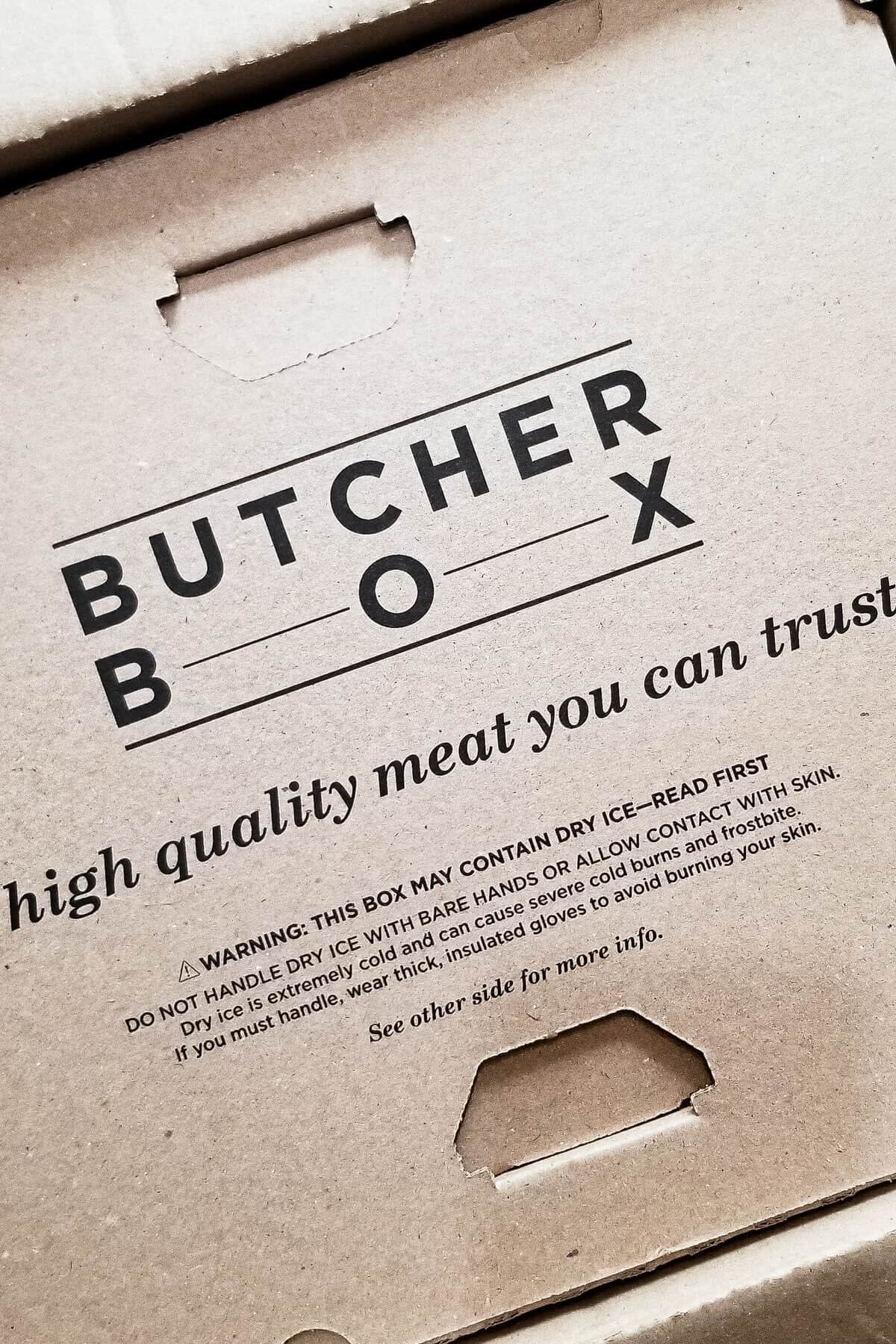 Close up shot of a brown cardboard ButcherBox box