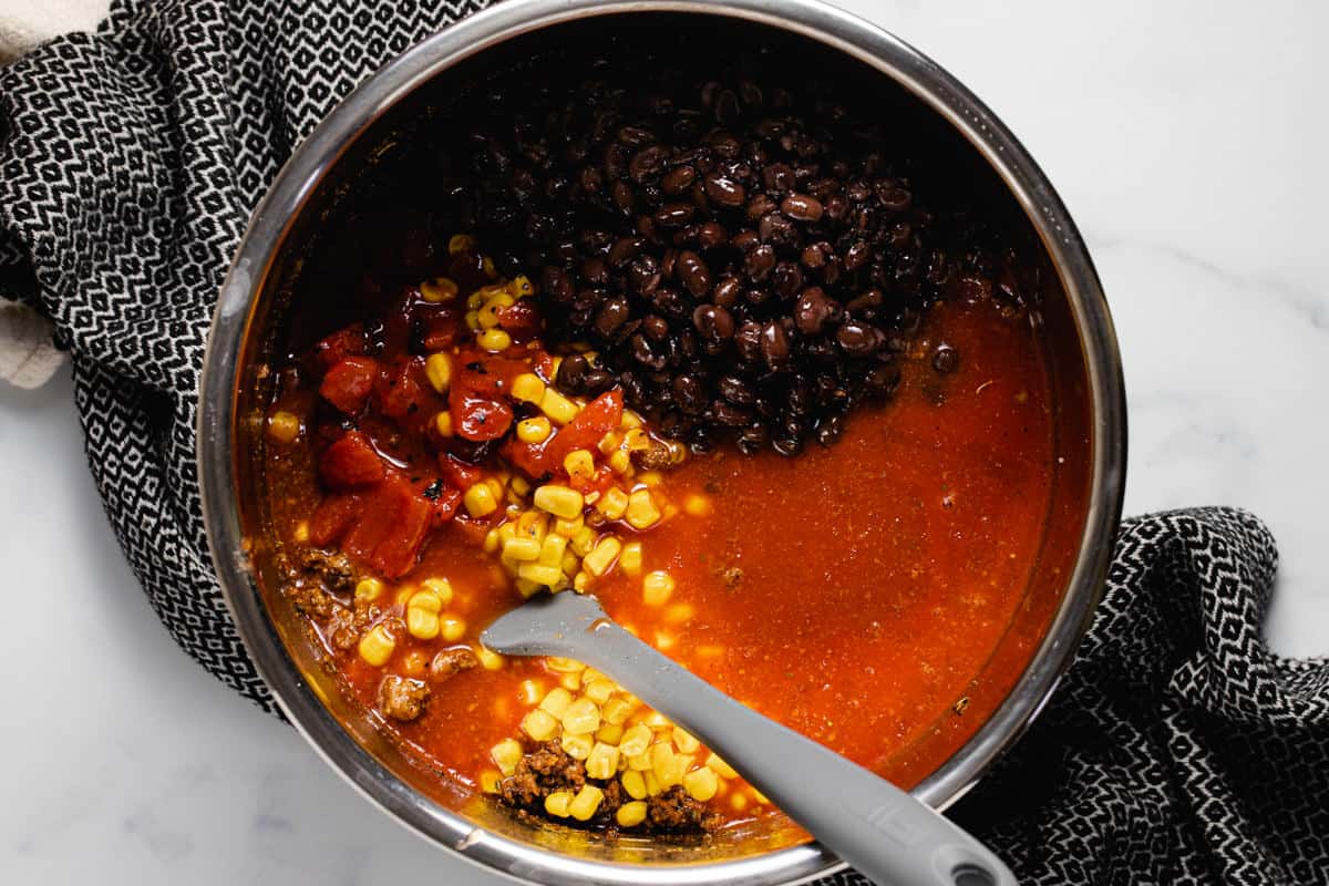 Instant pot insert with ingredients to make taco soup