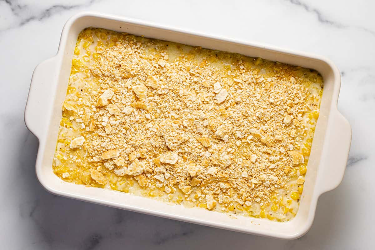 Cheesy corn casserole toped with Ritz crackers