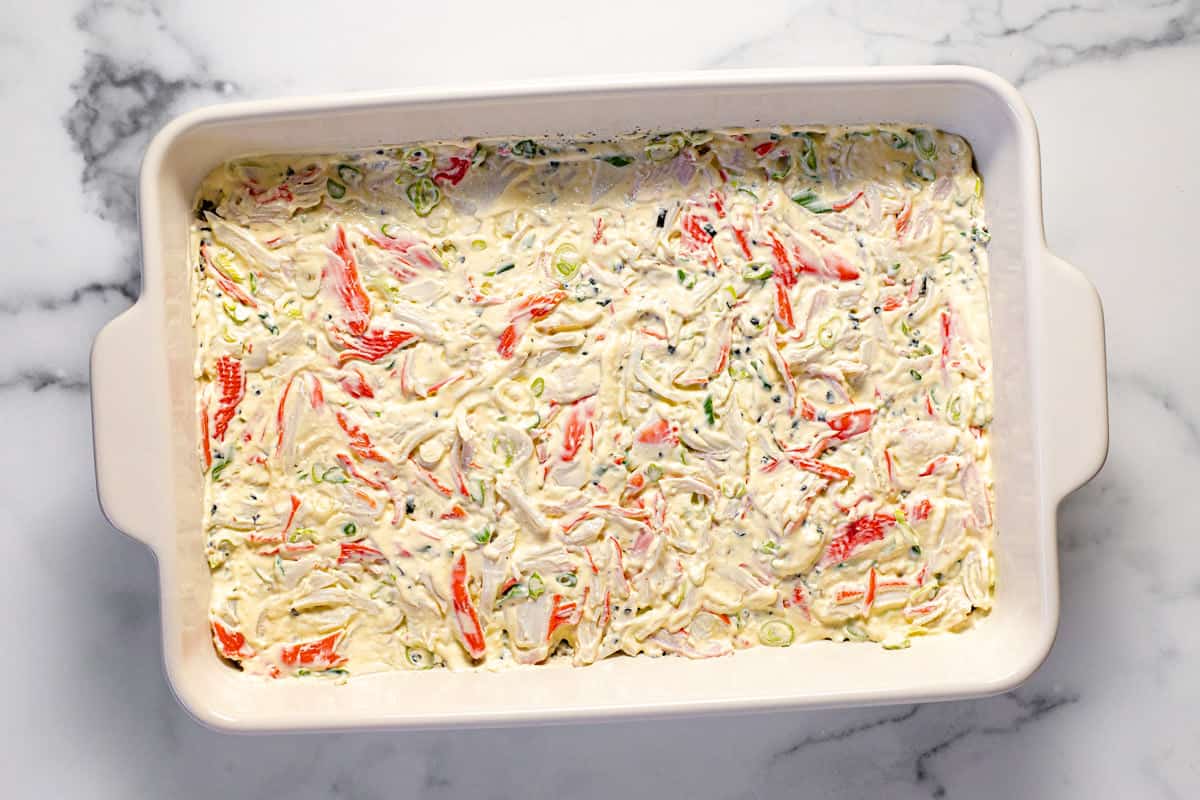Homemade sushi bake in a large white casserole dish